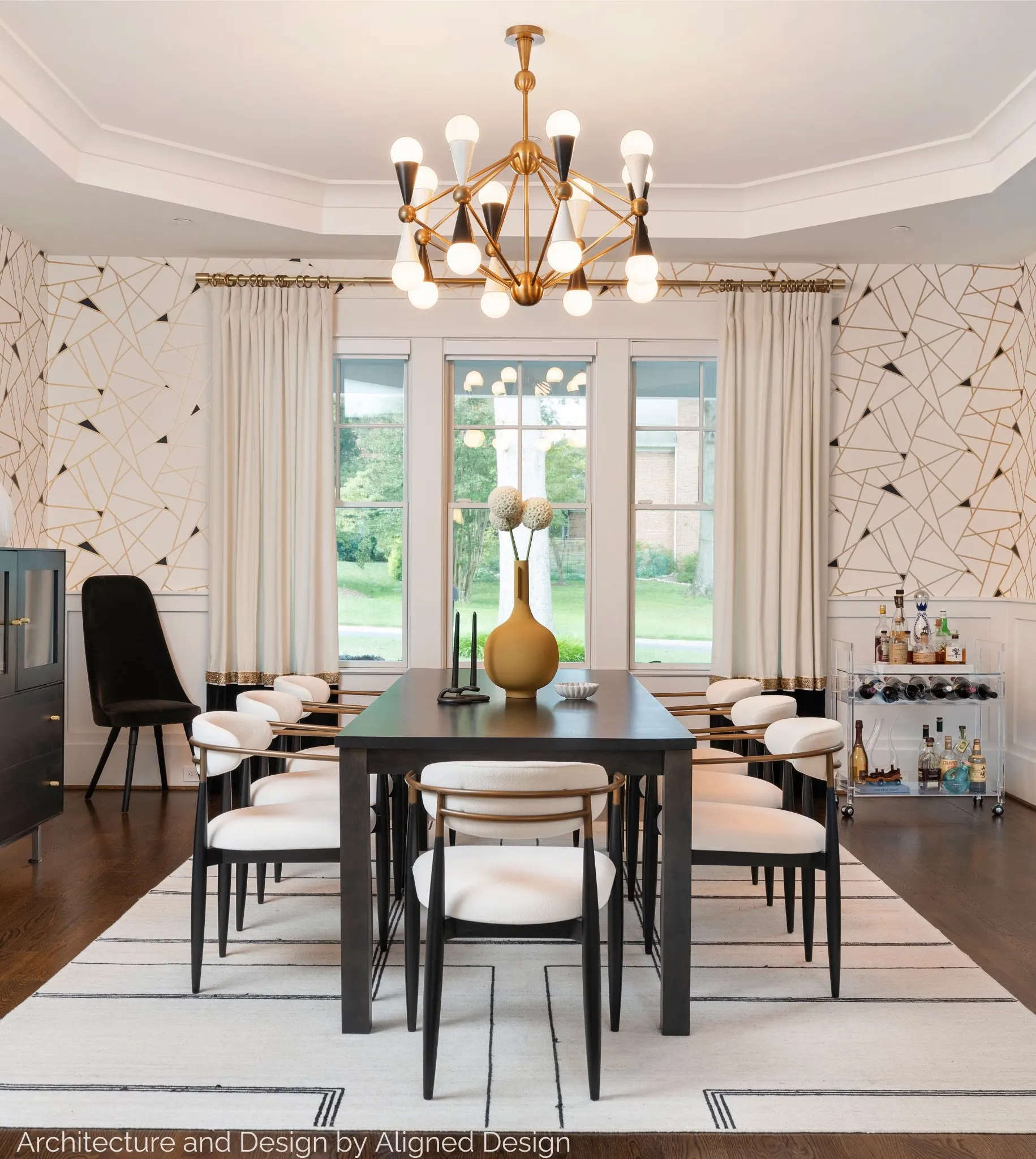 Dining room with sputnik chandelier for Aligned Design